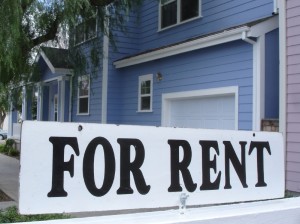 a place of rental homes and apartments sign